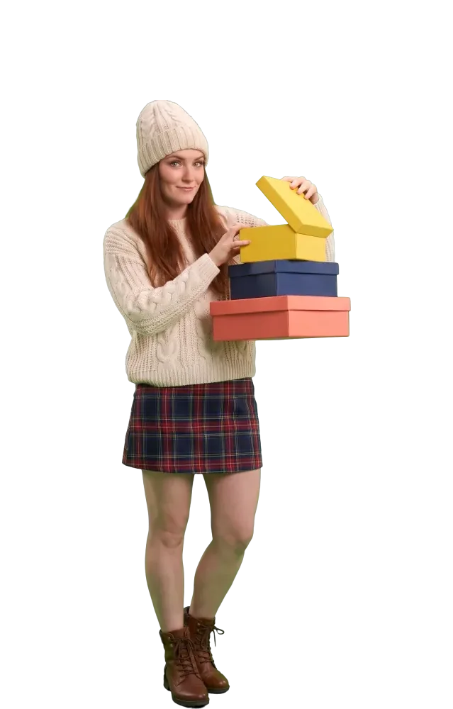 Woman lifting the lid of one of three small boxes