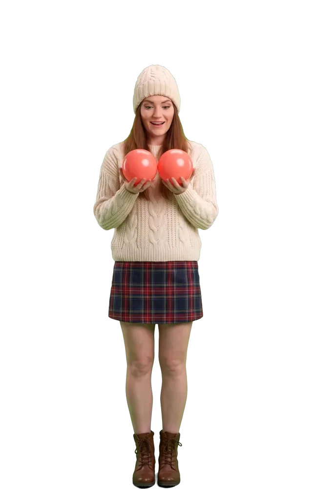 Woman surprised by two matching balls