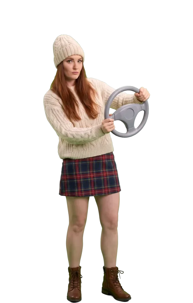 Woman pretending to steer with a toy steering wheel
