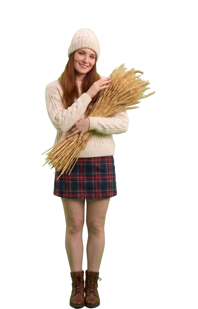 Woman holding a bundle of golden wheat