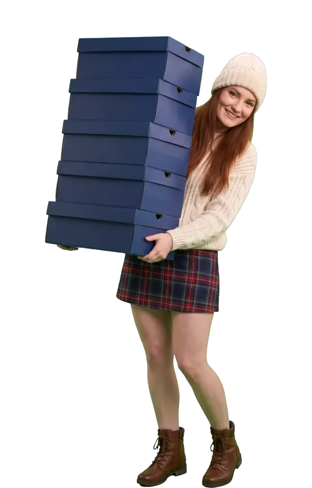 Woman carrying a tall stack of boxes